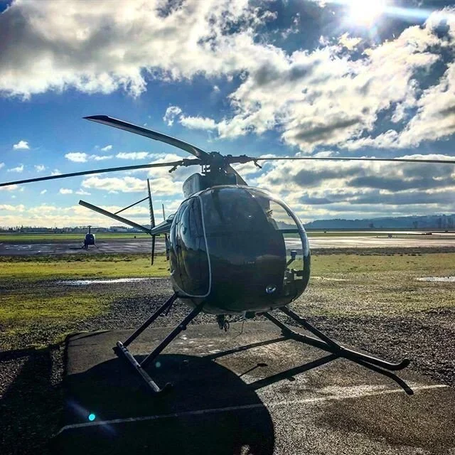 MD-500C turbine helicopter on the pad