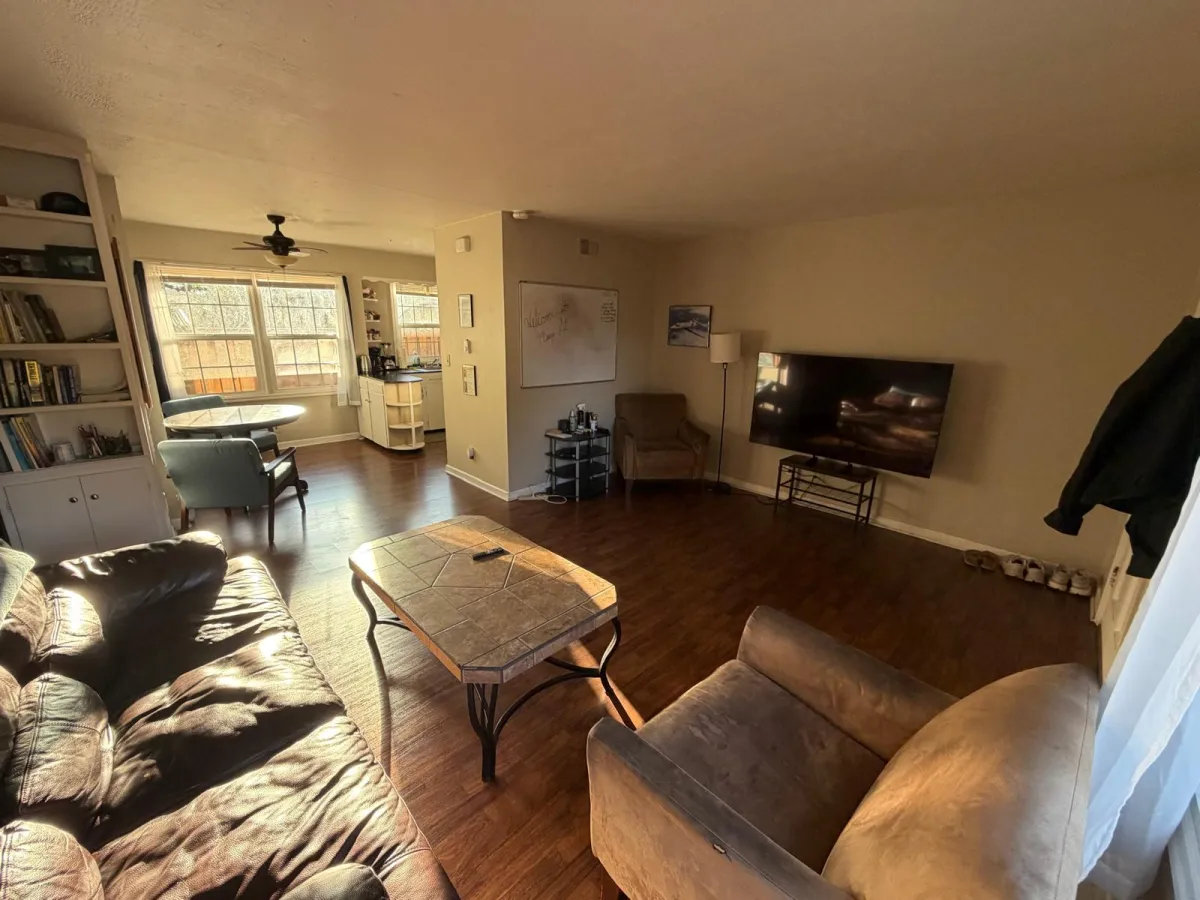 Furnished living room in the left unit of the JTH duplex